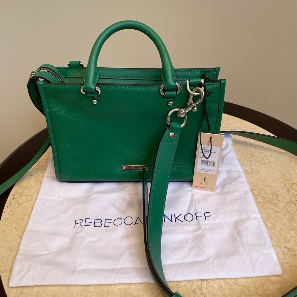 Rebecca Minkoff crossbody with dust bag. It has a tag but has been used once.